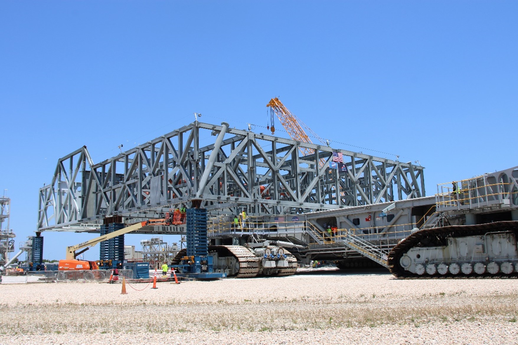 The crawler approaches the jacked Mobile Launcher 2 base during the Jack and Set milestone.