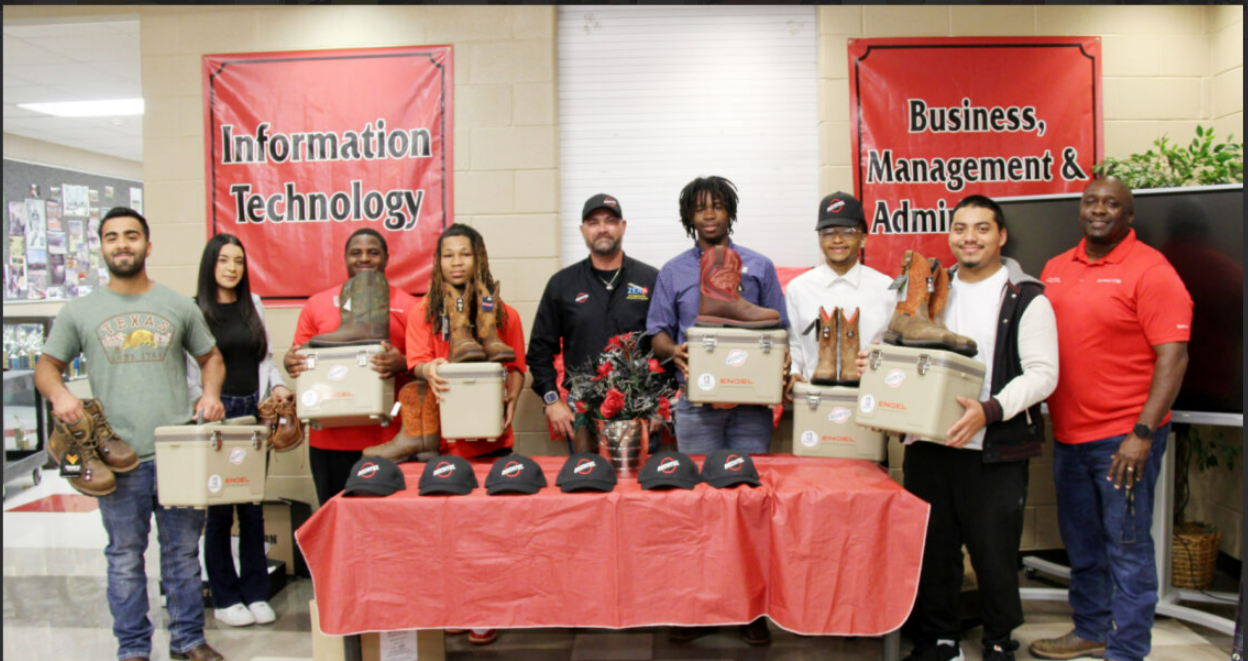 Recent graduates of the pipefitter and welding Career and Technical Education (CTE) programs at Port Arthur Memorial High School and Nederland High School in Port Arthur, Texas receive new work boots and coolers as they prepare for their first job with Bechtel at the Port Arthur LNG project. 