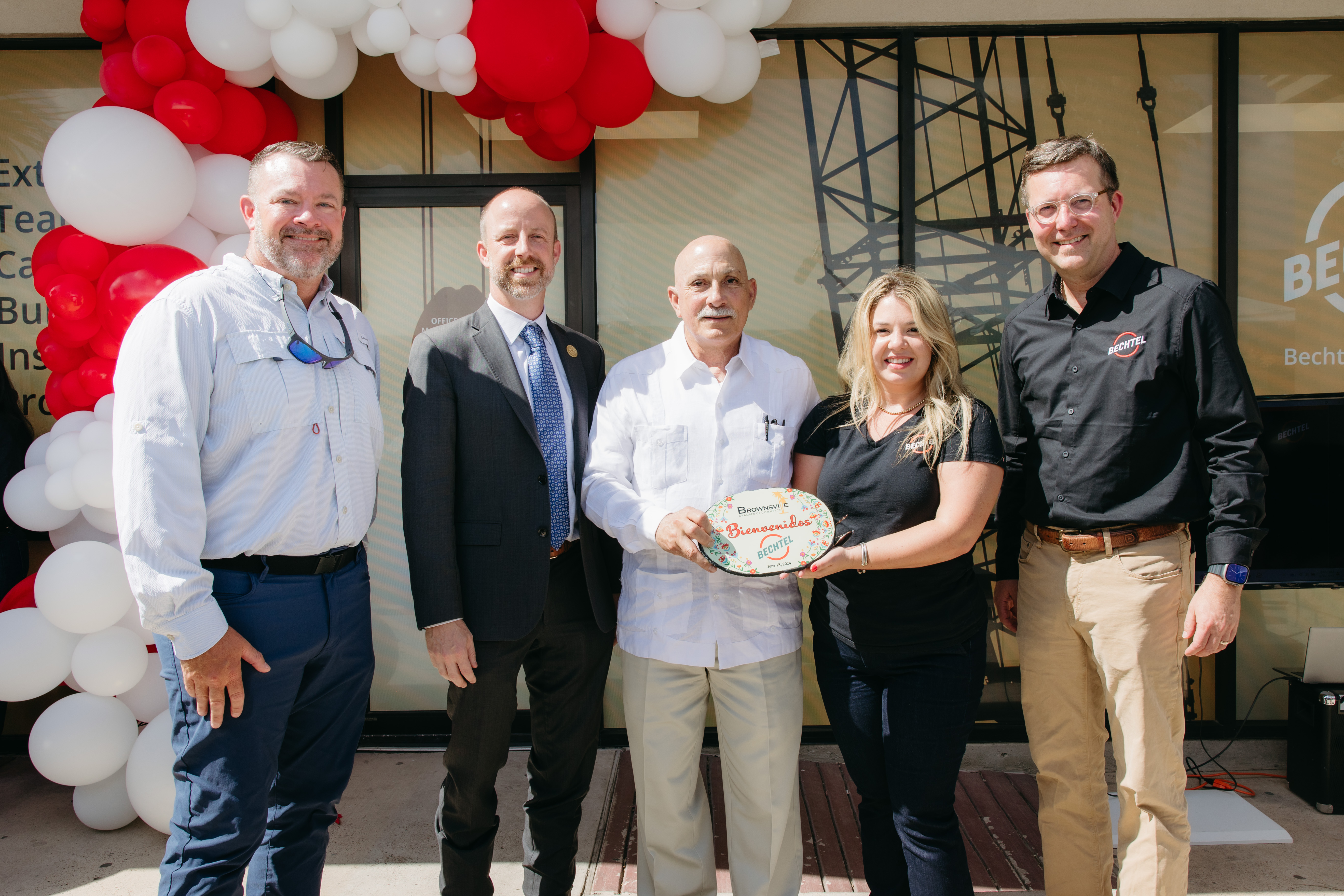 Pictured from left to right, Mike Demers, Deputy Site Manager, RGLNG, Brownsville Mayor John Cowen, Jr., Charles Cappello, Deputy Senior Project Manager, RGLNG, Monica Tellam, Community Engagement & Social Performance Manager, and Steve Solberg, Site Manager, RGLNG. 