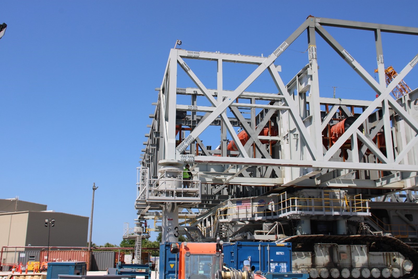 The crawler places the Mobile Launcher 2 base on the permanent mount mechanisms during the Jack and Set operation.