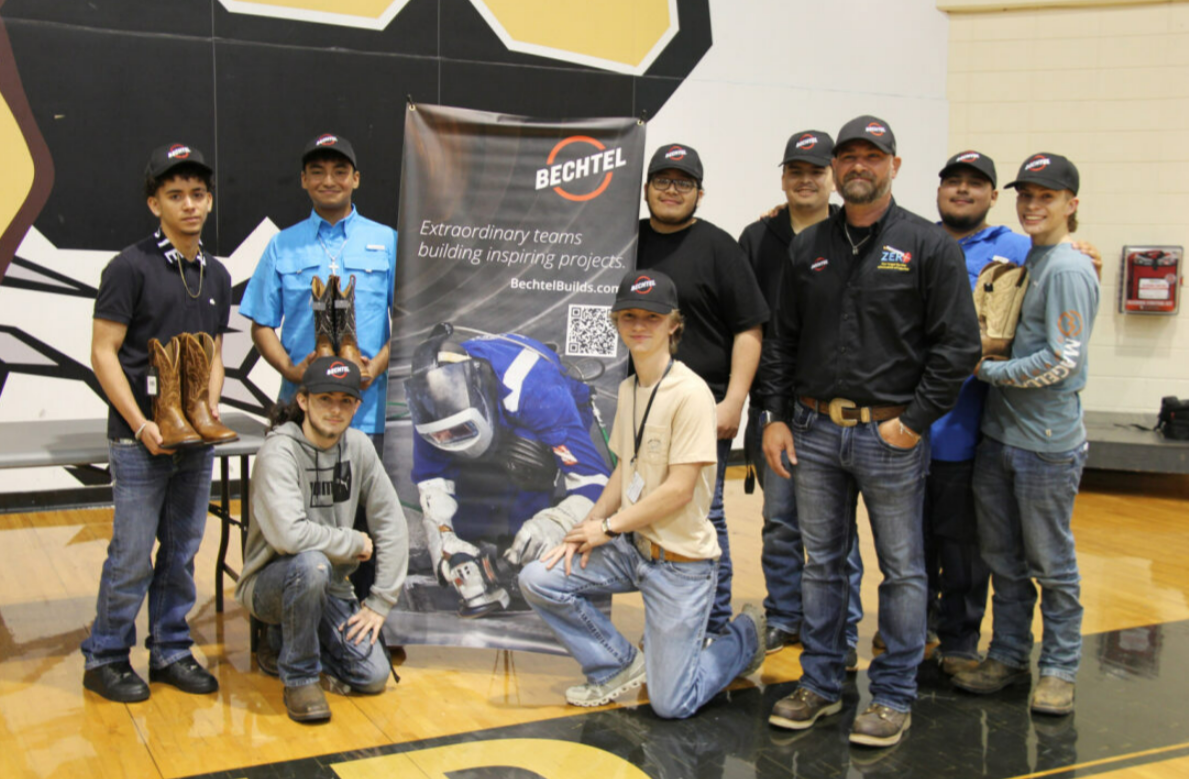 Recent graduates of the pipefitter and welding Career and Technical Education (CTE) programs at Port Arthur Memorial High School and Nederland High School in Port Arthur, Texas receive new work boots and coolers as they prepare for their first job with Bechtel at the Port Arthur LNG project. 