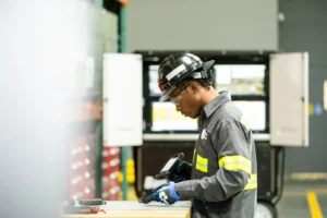 Crew member scanning an item at Bechtel Equipment Operations (BEO)